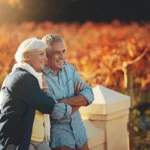 Two senior citizens looking into the distance, representing a $5 million retirement goal.
