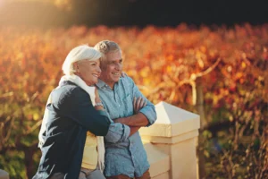 Two senior citizens looking into the distance, representing a $5 million retirement goal.